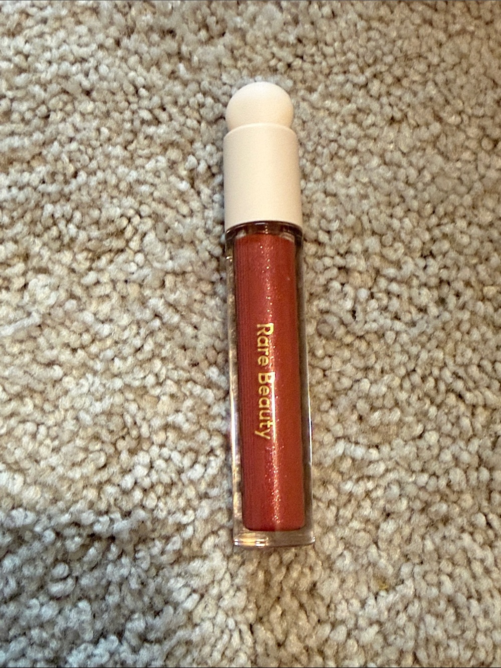 Rare Beauty Lip Gloss in Warm Rose Gold Shimmer